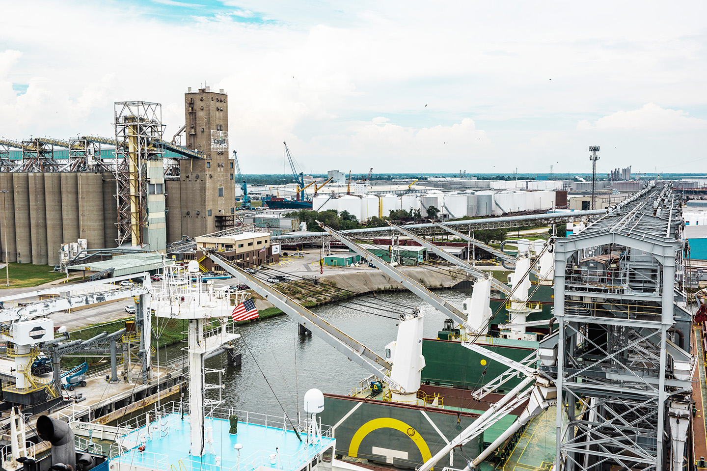 Photos shows large concrete silos and loading equipment at an export elevator in the western Gulf of Mexico.