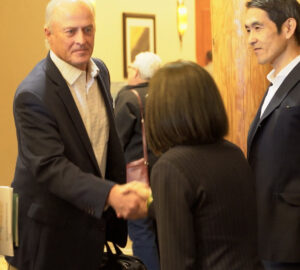 Newly-seated USW Chairman Jim Pellman greets Japanese officials at a meeting in 22024.