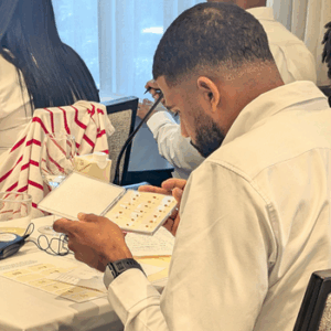 Flour miller examines examples of U.S. wheat grades.