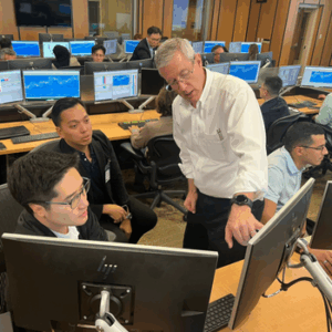 Frayne Olson Assists Students at NCI Course