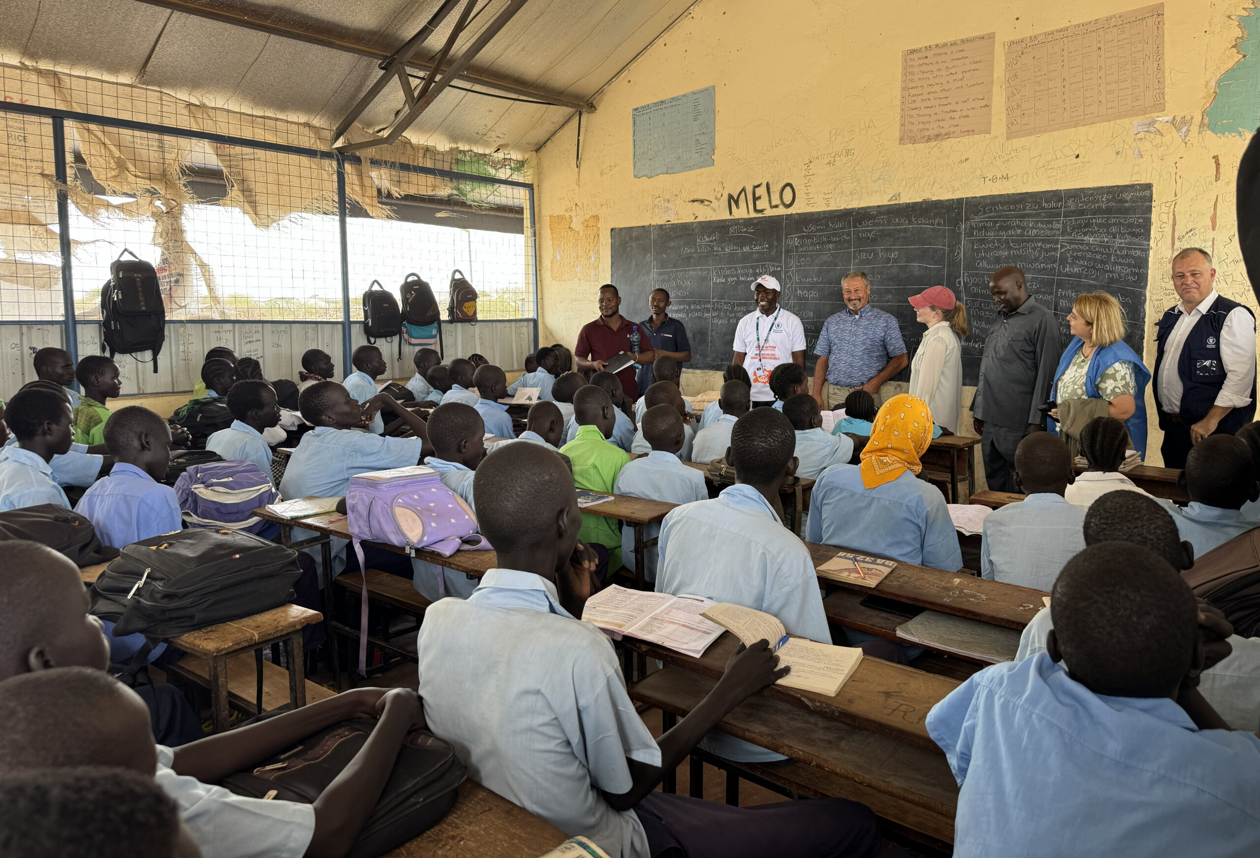 group talks at school building