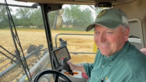 Mark Birdsall, Vice Chairman of the North Dakota Wheat Commission, harvests wheat on his farm near Berthold, North Dakota. Birdsall grows durum and hard red spring wheat.