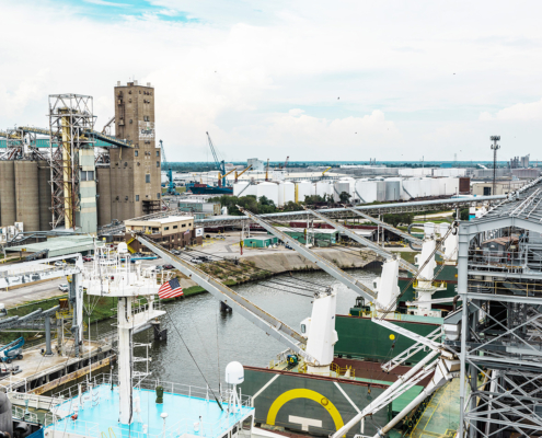 Photos shows large concrete silos and loading equipment at an export elevator in the western Gulf of Mexico.