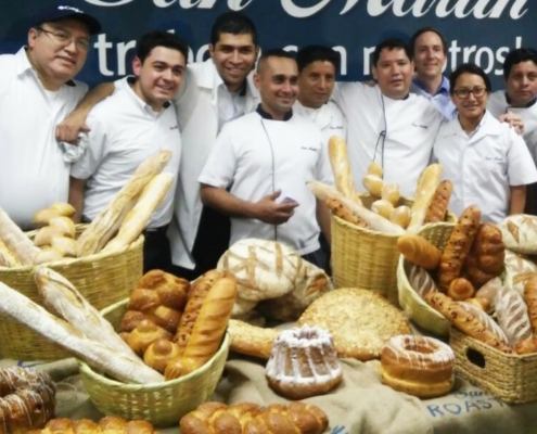 Team of bakers showing their test production.