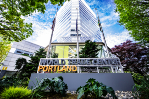Image shows the sign and building for the Portland World Trade Center, Portland, Oregon.